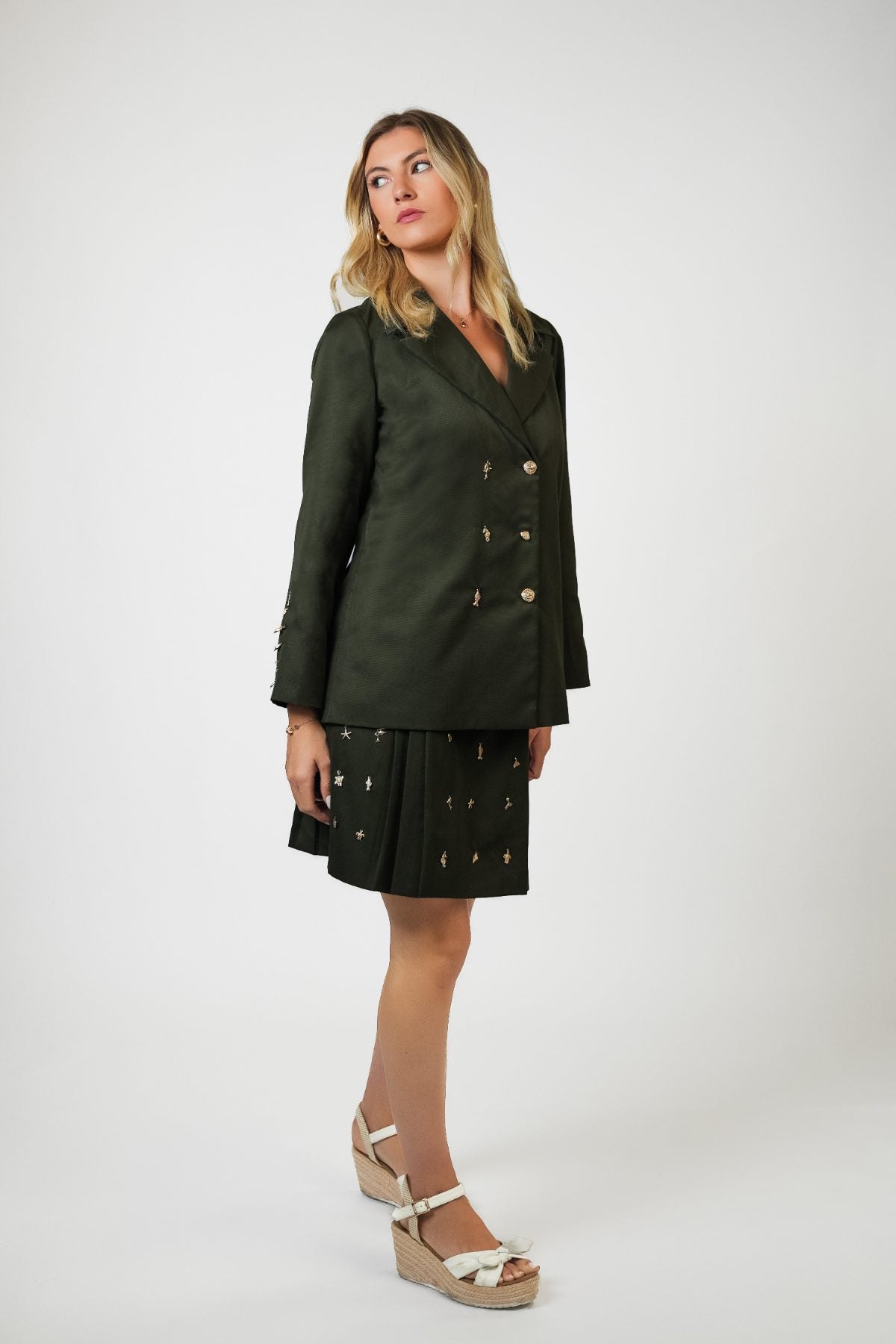 Olivia Full Sleeve Co-Ord Set, olive green gabardine cotton double-breasted blazer and skort co-ord set with gold-toned buttons and hand-embellished golden charms – flat lay detail