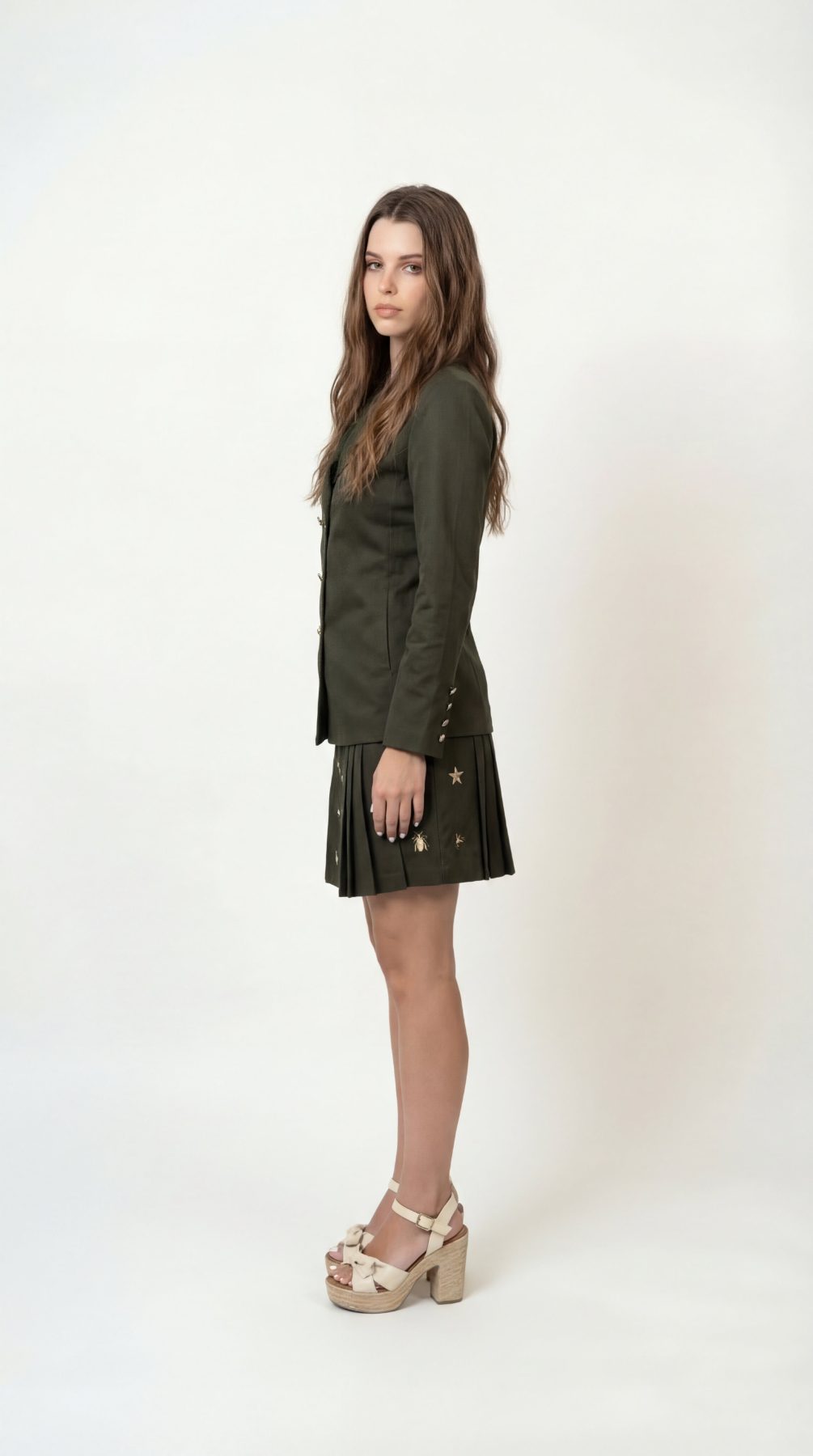 Olivia Full Sleeve Co-Ord Set, olive green gabardine cotton double-breasted blazer and skort co-ord set with gold-toned buttons and hand-embellished golden charms – side view